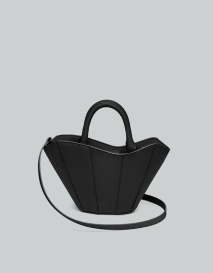 Spläshini - Clean, contemporary, compact crossbody bag.