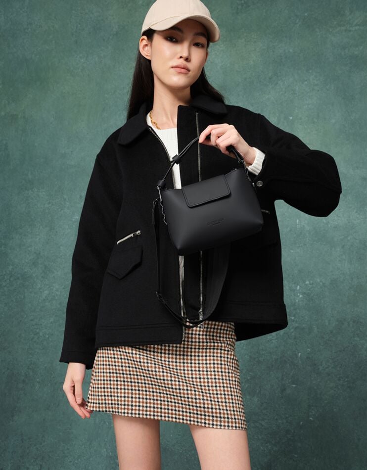 Spläshini - Clean, contemporary, compact crossbody bag.