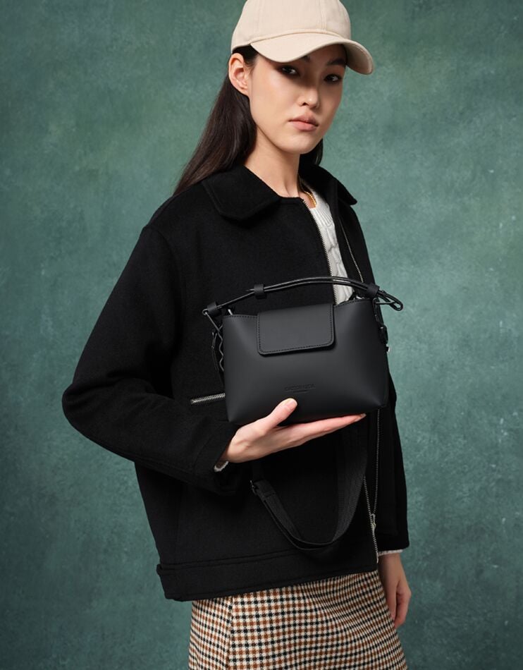 Spläshini - Clean, contemporary, compact crossbody bag.