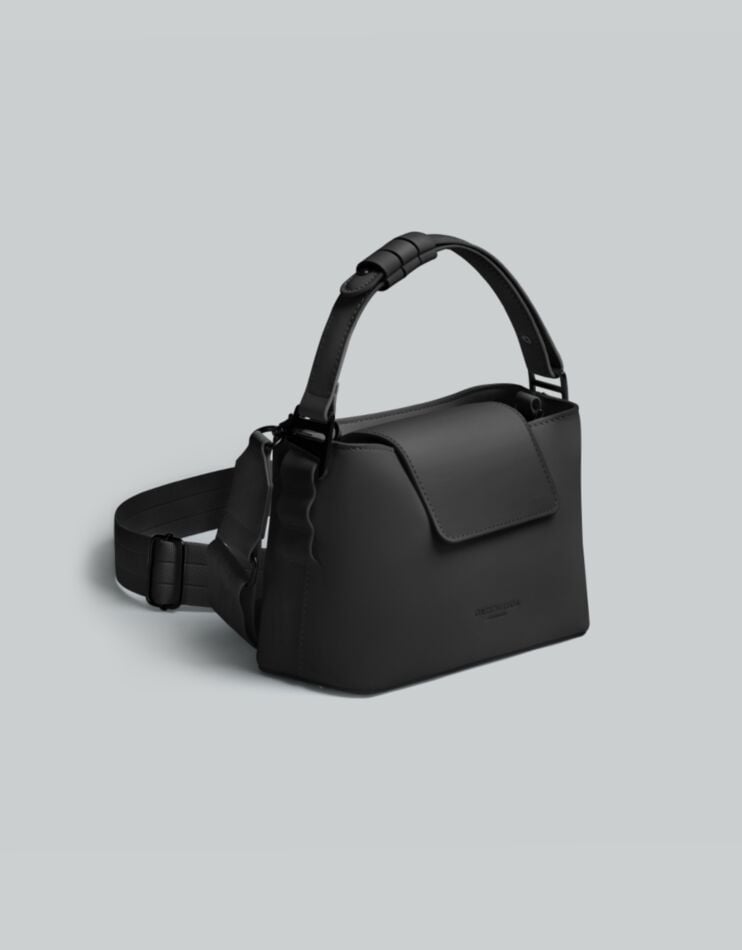 Spläshini - Clean, contemporary, compact crossbody bag.