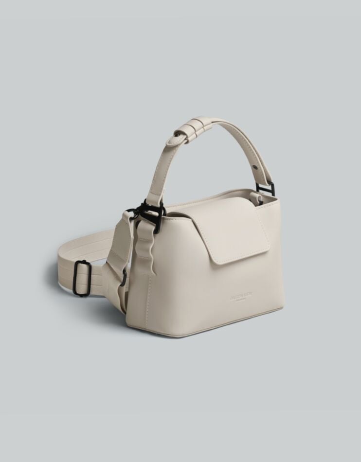 Spläshini - Clean, contemporary, compact crossbody bag.