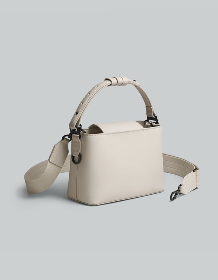 Spläshini - Clean, contemporary, compact crossbody bag.