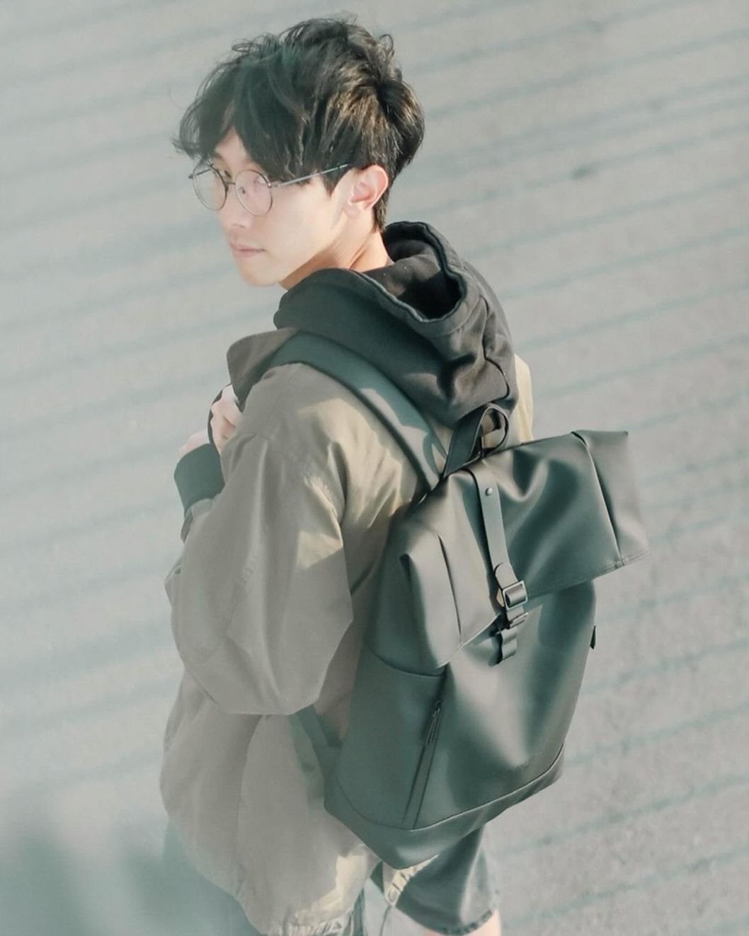 @17187kao wears our Rullen 16” backpack 