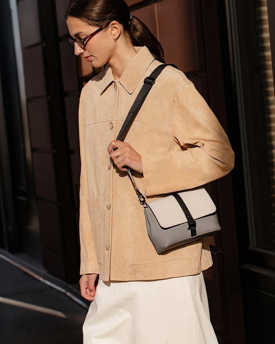 You didnt realise how much you needed a bag like this until you had one. Its raining. Youre running late. Your hands are full.And your bag? Completely fine.The Spläsh Crossbody is built for exactly that moment. Waterproof, compact, and designed with the kind of quiet Scandinavian simplicity that just works — every single day.Now in new colours — Bear, Charcoal Grey, Cloud Cream/Greige, #GastonLuga #AnywhereWithGL