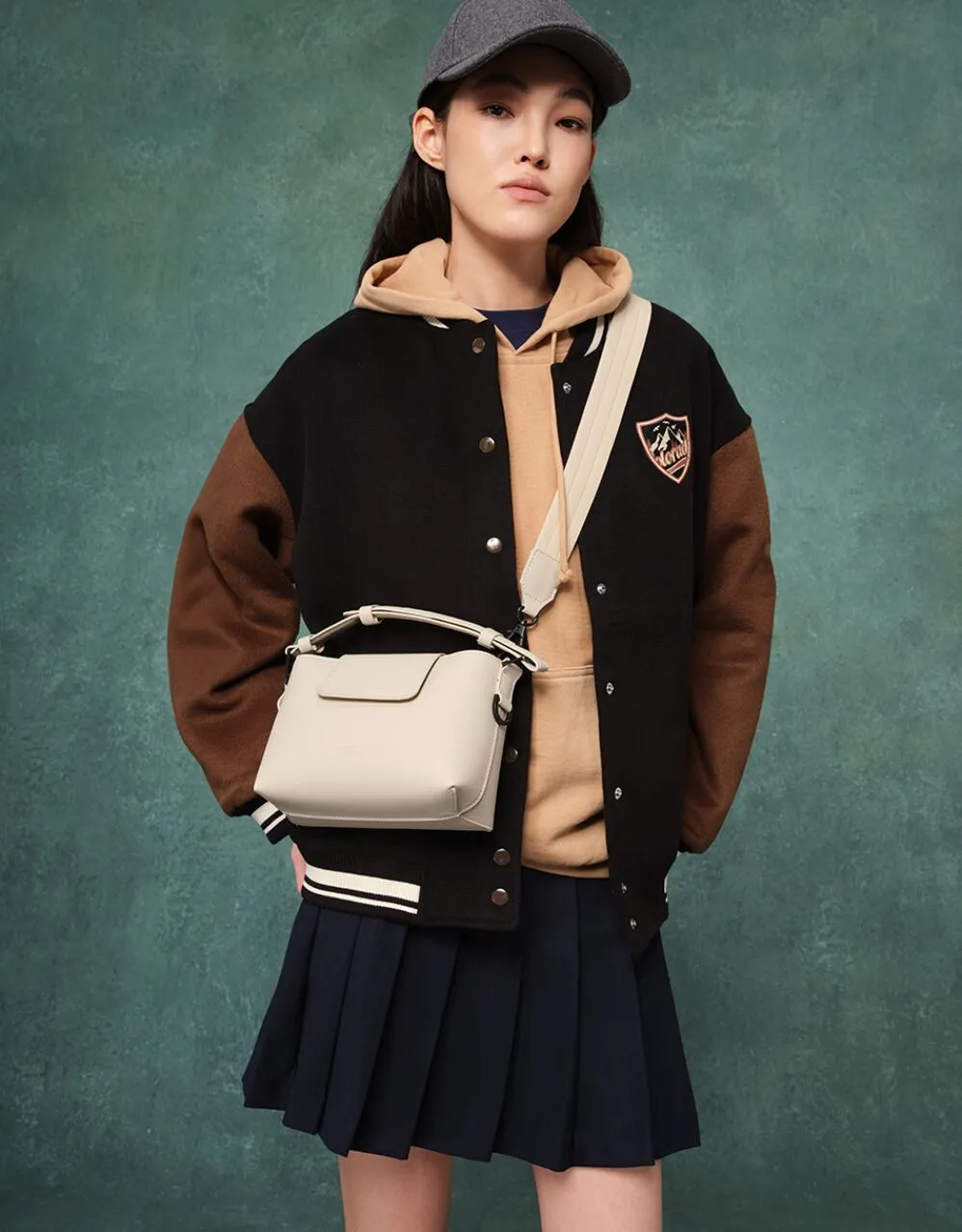 Spläshini - Clean, contemporary, compact crossbody bag.