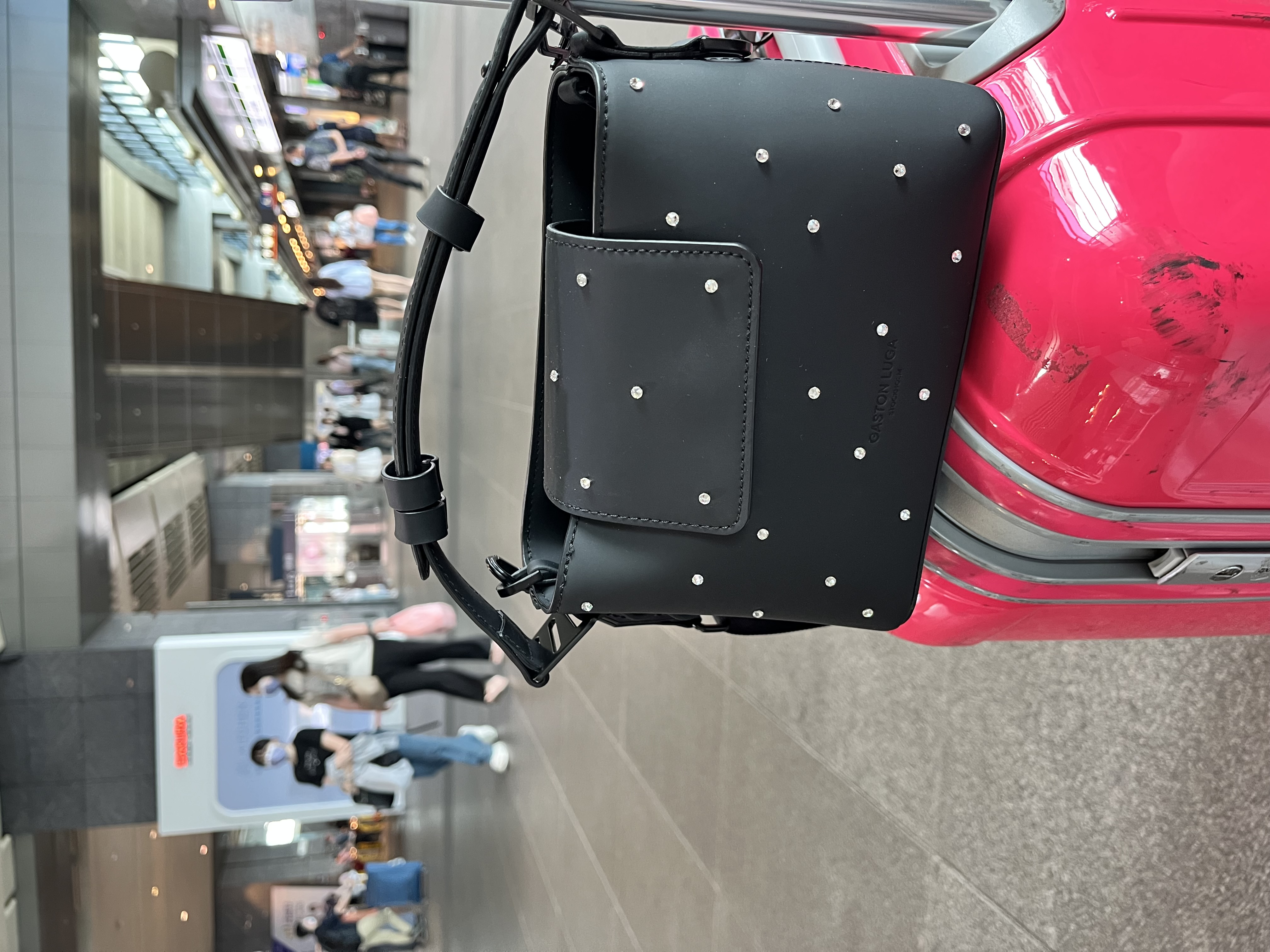 Spläshini - Clean, contemporary, compact crossbody bag.