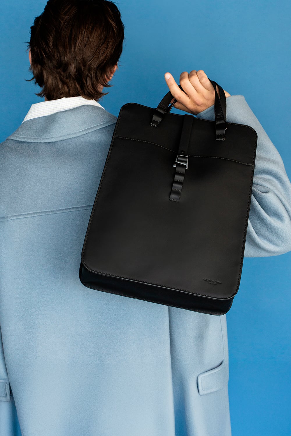 Model carrying a black Cleo Backpack